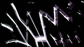 Bright white patterns that move apart in different directions. Design. A black background from which light comes from geometric shapes made in abstraction. video