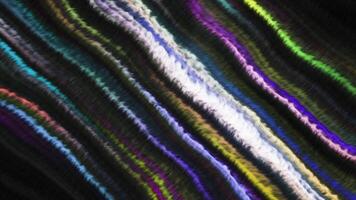 Black background with bright thin multicolored stripes. Motion. Colored lines in computer graphics that shine. video