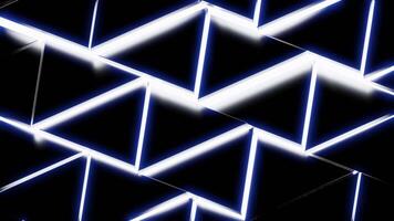 Bright white patterns that move apart in different directions. Design. A black background from which light comes from geometric shapes made in abstraction. video