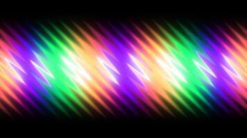 Background with line of abstract wavy glow. Motion. Colorful wavy liquid glow lines on black background. Shiny wavy lines move slowly in strip on black background video