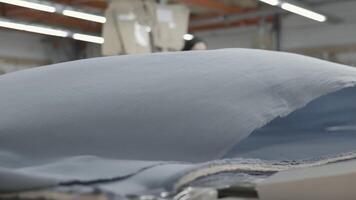The factory produces industrial fabric with large rolls using advanced machinery and automation video