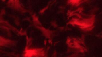 Background with glowing iridescent plasma pattern. Motion. Colored liquid plasma pattern on black background. Moving patterns in plasma fluid video