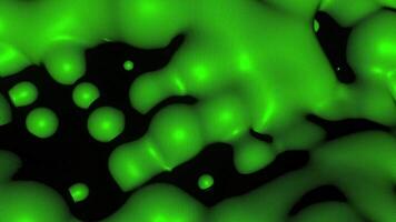 Moving liquid on black background. Design. Liquid 3d matter with droplets and wave motion. Liquid moves in waves with drops video