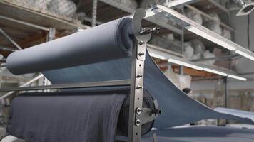 Fabric Rollers are crucial in textile factory for efficient fabric handling in production video