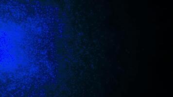 Black background with purple and blue radiance. Motion. Splashing stars made in 3d animation that fly in different directions. video
