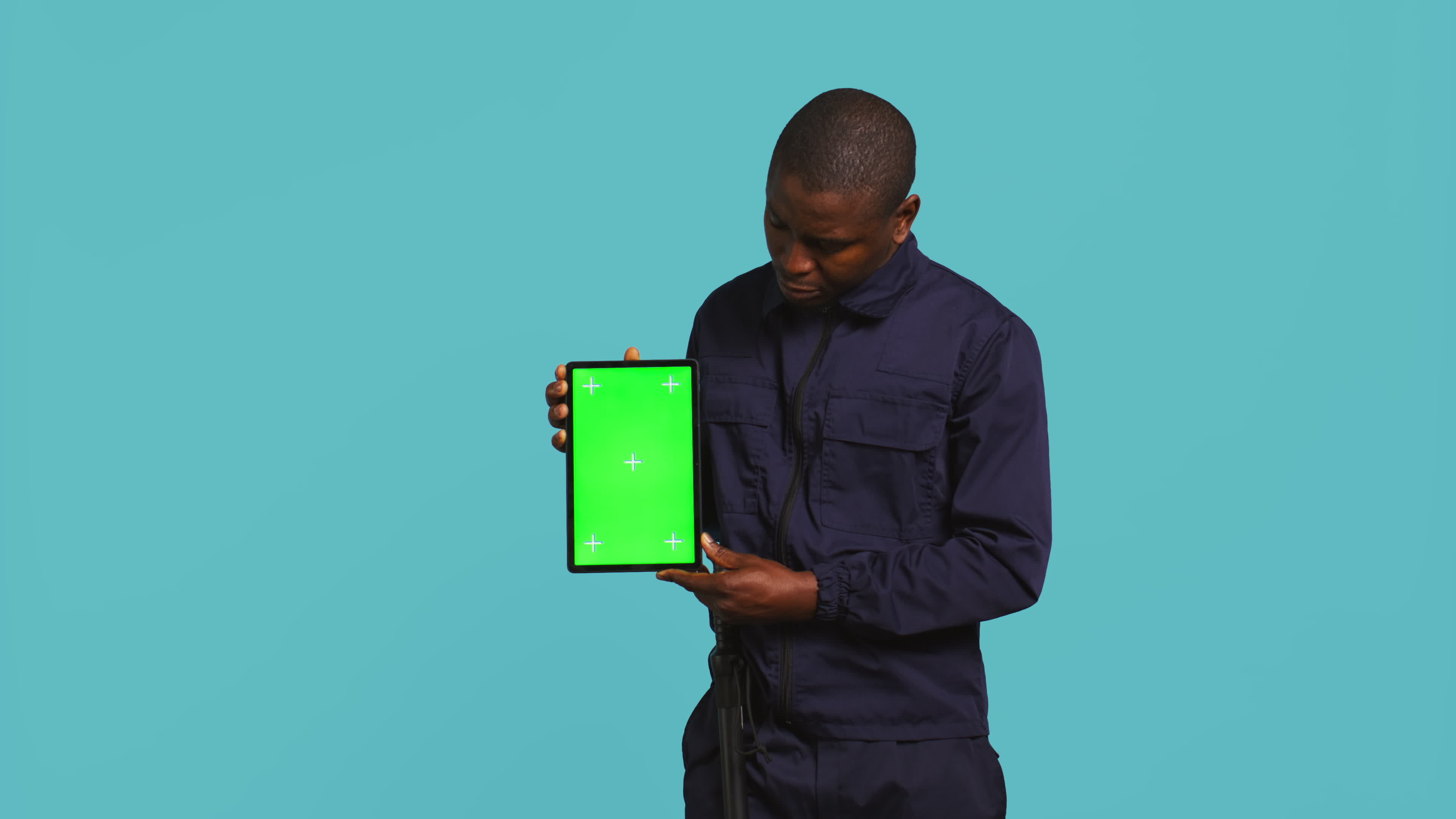 Happy security guard working protection job presenting mockup tablet