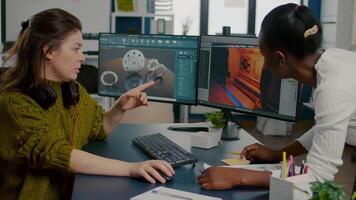Gamer creator explaning to african worker how testing game level interface, developing new design in creative office using pc with two monitors. Player online games with technology network wireless. video