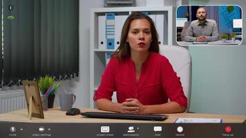 Employee talking in front of camera having call with manager. Freelancer working with remotely coworker during virtual meeting discussing in online conference, footage with software overlay video