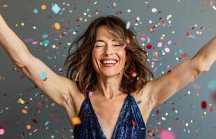 Woman Celebrating With Confetti photo