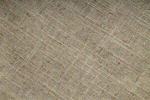 Close-up detail of fabric natural color Hemp material pattern design wallpaper. can be used as background or for graphic design photo