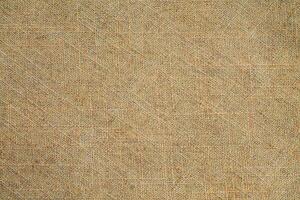Close-up detail of fabric natural color Hemp material pattern design wallpaper. can be used as background or for graphic design photo
