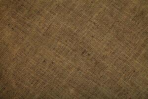 Close-up detail of fabric natural color Hemp material pattern design wallpaper. can be used as background or for graphic design photo