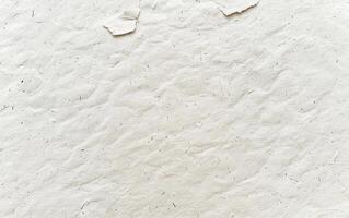 Lightly Speckled Recycled Paper Background With Subtle Textures and Creased Edges photo