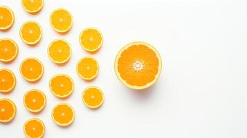 Minimalist shot of a whole orange next to segments artistically arranged, creating a contrast of whole and part, all isolated against a stark white background. photo