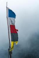 tibetan prayer flags in the mountains in nepal, Mountain in nepal, mount everest country, flags of the mountain in nepal photo
