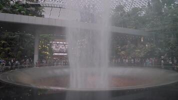 Singapore, Singapore - May 3, 2024 - The Jewel Rain Vortex, the largest indoor waterfall and main attraction at Changi Airport, Singapore, designed by Moshe Safdie. video