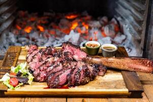 Excellent cuts of top quality beef very rare, almost raw. photo