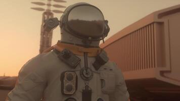 Astronaut on the surface of Mars. Mars colonization concept. 3d illustration photo