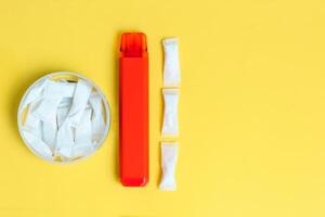 Nicotine pads snus, cigarette replacement, together with an electronic cigarette. photo
