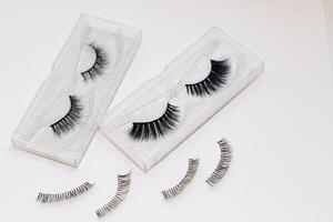 False decorative eyelashes on a white background. photo