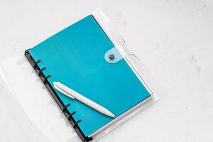 The pen lies in the notebook, the concept of study, time management. photo