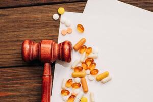 Gavel judges and tablets on the table with documents with a place for text. photo