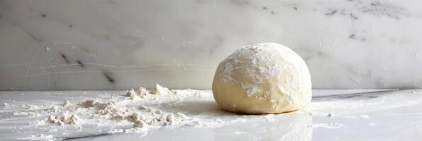 Homemade Pizza Dough on White Countertop, Fresh and Ready to Bake photo