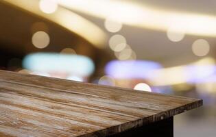 Empty wood table top and blur of out door garden background Empty wooden table space for text marketing promotion. blank wood table copy space for background photo
