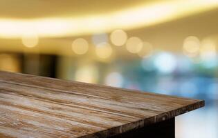 Empty wood table top and blur of out door garden background Empty wooden table space for text marketing promotion. blank wood table copy space for background photo