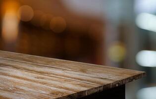 Empty wood table top and blur of out door garden background Empty wooden table space for text marketing promotion. blank wood table copy space for background photo