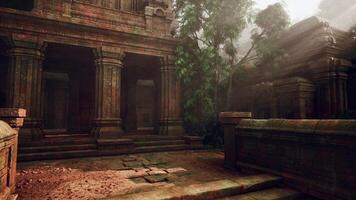 Ancient Temple Ruins Embedded in Dense Forest photo