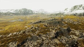 Aerial View of Snow-Covered Mountain Range photo