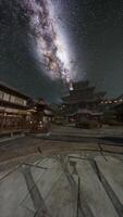 Night Sky With Milky Way Over Japanese Temple photo
