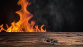 Empty dark textured wooden surface on blurred background with burning fire, smoke. Mock up with copy space. Template showcase scene for display, montage, advertising product. photo