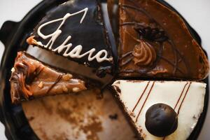 Different pieces of cake. A sweet snack. Assorted cakes. photo