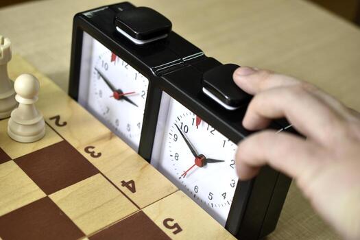 A chess board and a chess clock. Chess competitions. photo