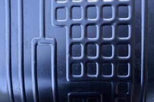 Shiny metal surface. The shiny radiator of an old refrigerator. photo
