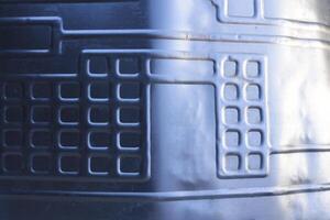 Shiny metal surface. The shiny radiator of an old refrigerator. photo