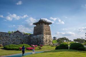 Old city wall at Hwaseong Fortress in summer, Traditional Architecture of Korea at Suwon, South Korea. photo