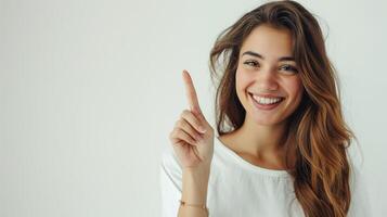 Human smiling pointing at something isolated on white background photo