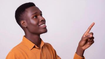 Human smiling pointing at something isolated on white background photo