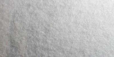 White artificial foam, foam texture on a light background. photo