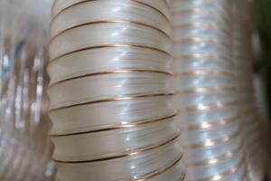 Flexible PUR antistatic suction hose for air conditioning, background flexi hose, industrial ventilation photo