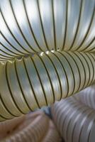 Flexible PUR antistatic suction hose for air conditioning, background flexi hose, industrial ventilation photo