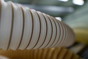 Flexible PUR antistatic suction hose for air conditioning, background flexi hose, industrial ventilation photo