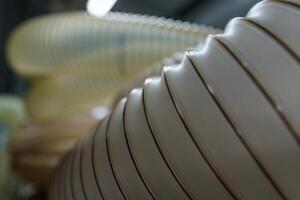 Flexible PUR antistatic suction hose for air conditioning, background flexi hose, industrial ventilation photo