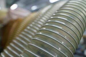 Flexible PUR antistatic suction hose for air conditioning, background flexi hose, industrial ventilation photo