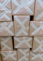 Paper parcels boxes with shipping goods in warehouse photo