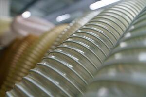 Flexible PUR antistatic suction hose for air conditioning, background flexi hose, industrial ventilation photo