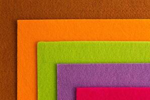 Colorful background pattern and texture of colored felt board. photo